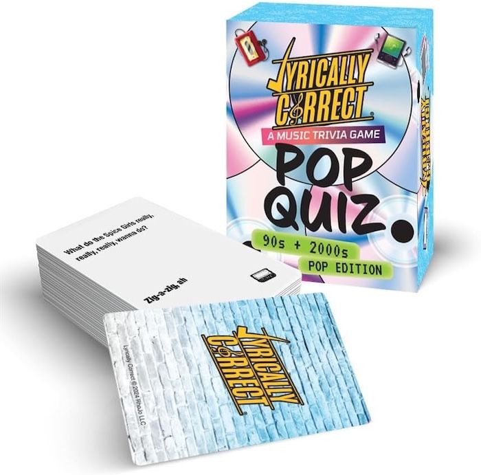 Lyrically Correct card game packaging next to the game's card deck