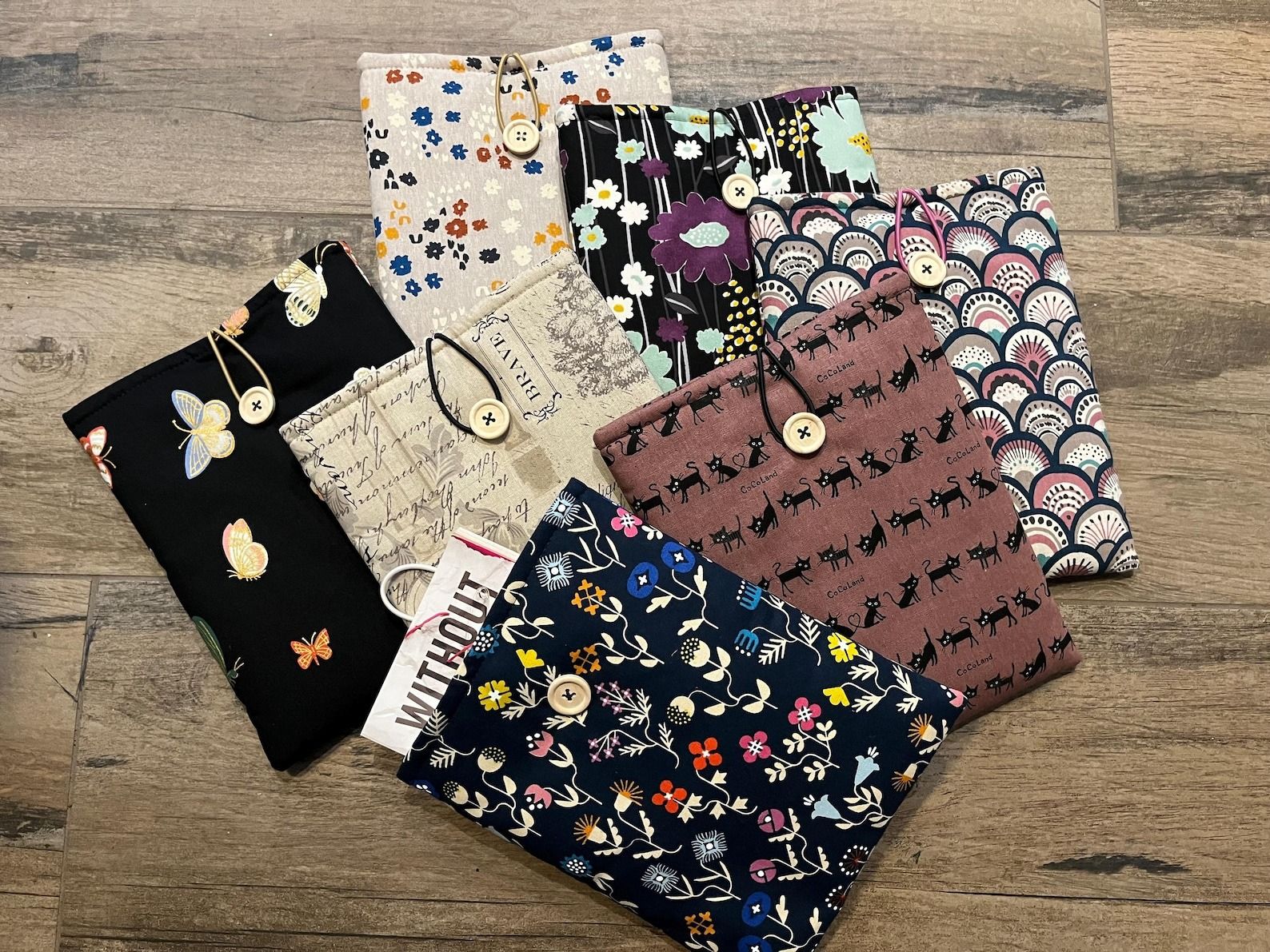 a stack of fabric book sleeves